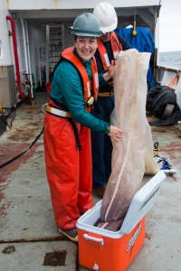 Anna McLaskey empties a vertical net full of salps. Photo Credit: Meghan Shea